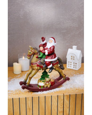 Dekorácia MagicHome Vianoce, Santa s chlapčekom na koni, polyresin, 28x10x30 cm